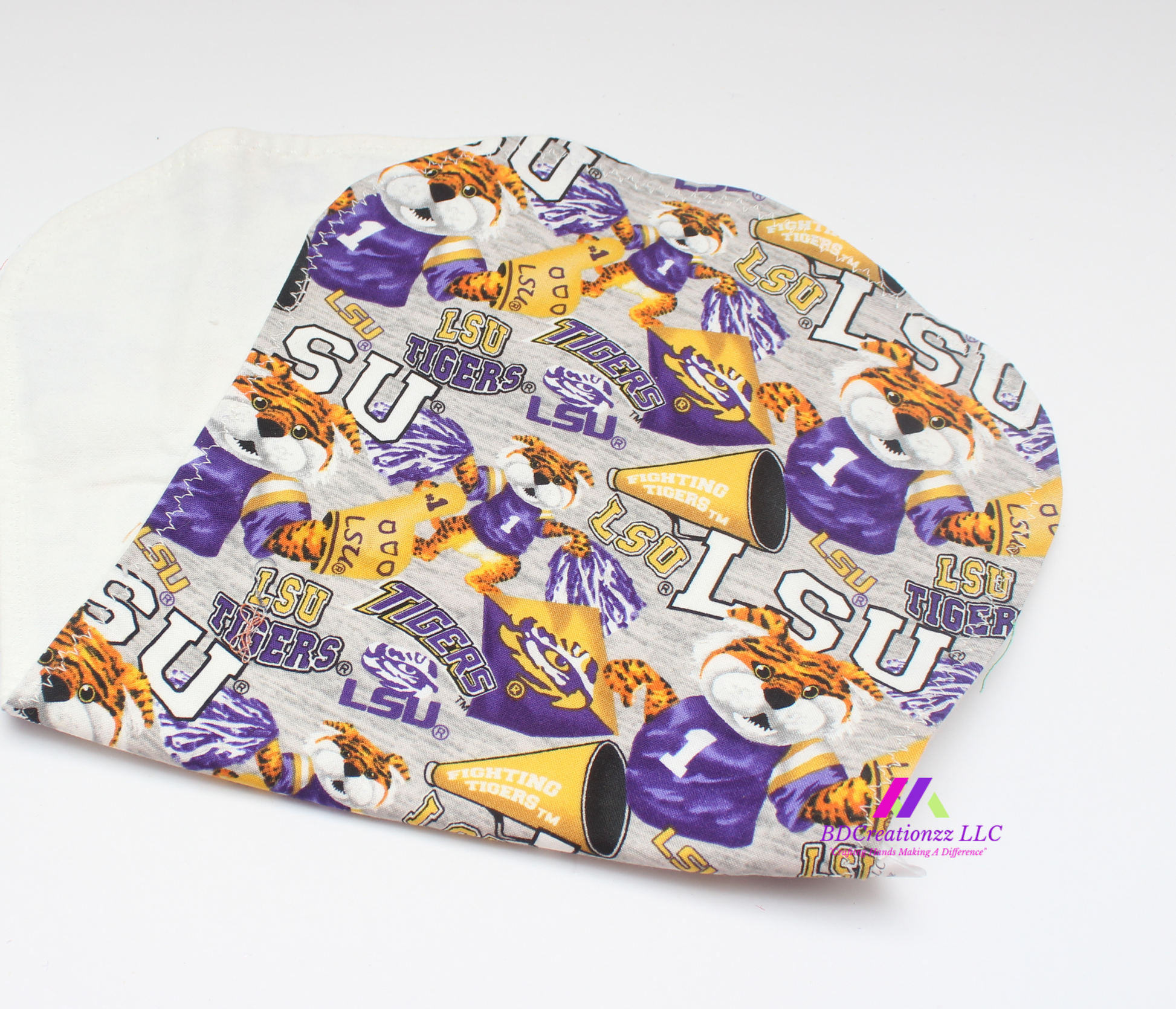 Handmade coordinating baby beanie hat with football print band.