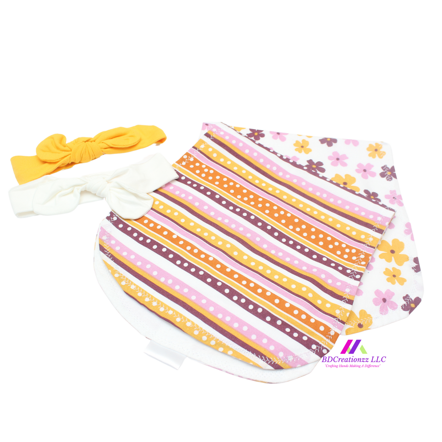 Handmade floral baby bib with coordinating burp cloth for baby girls.