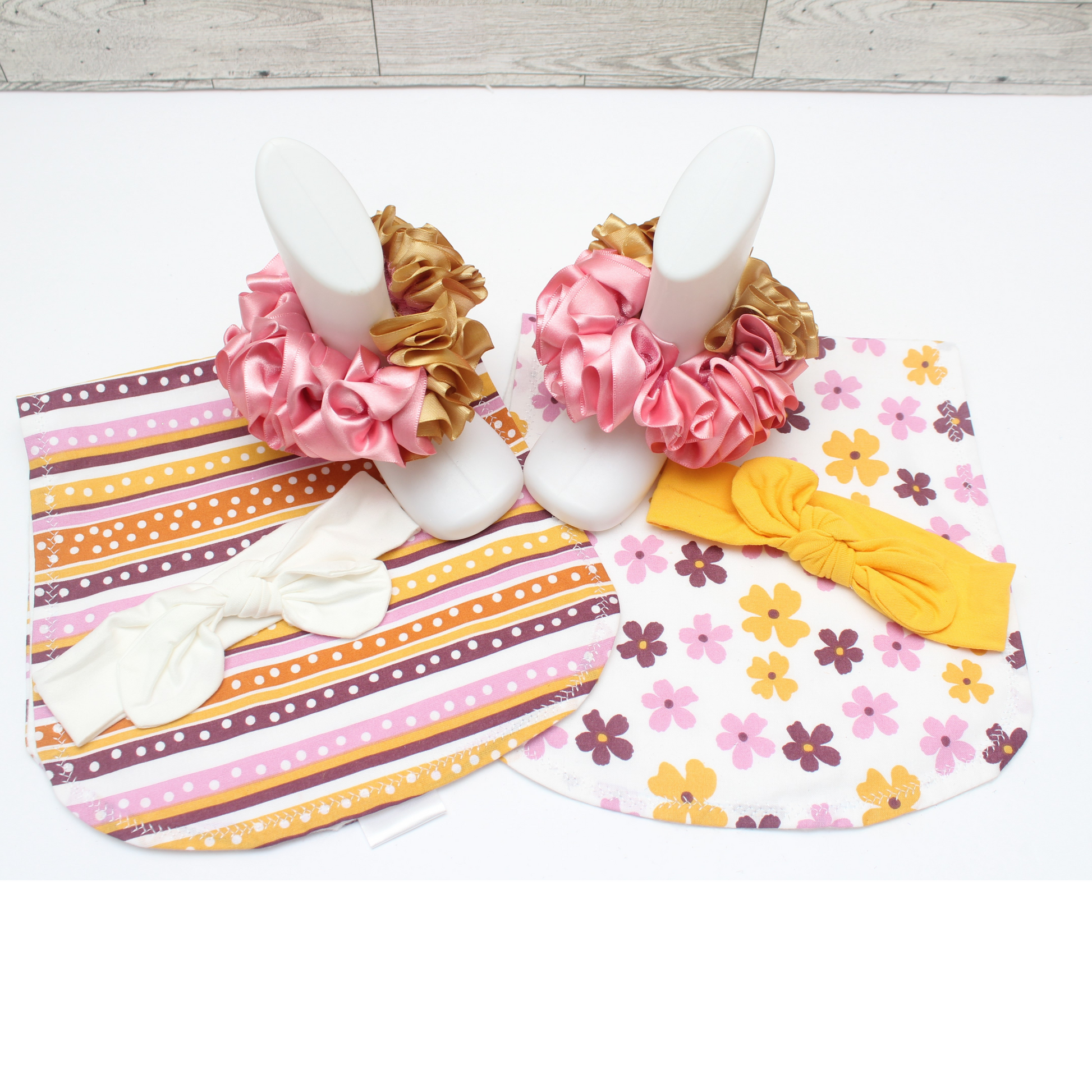 “Complete baby girl gift set with socks, cloths, and headbands”