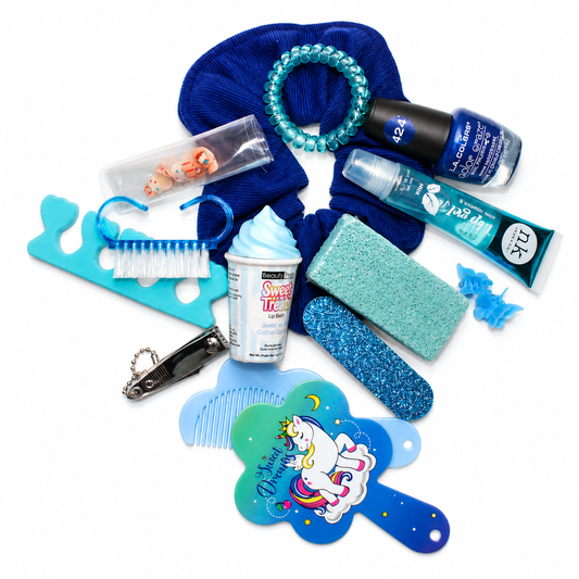 Collection of blue beauty and personal care products on a white background