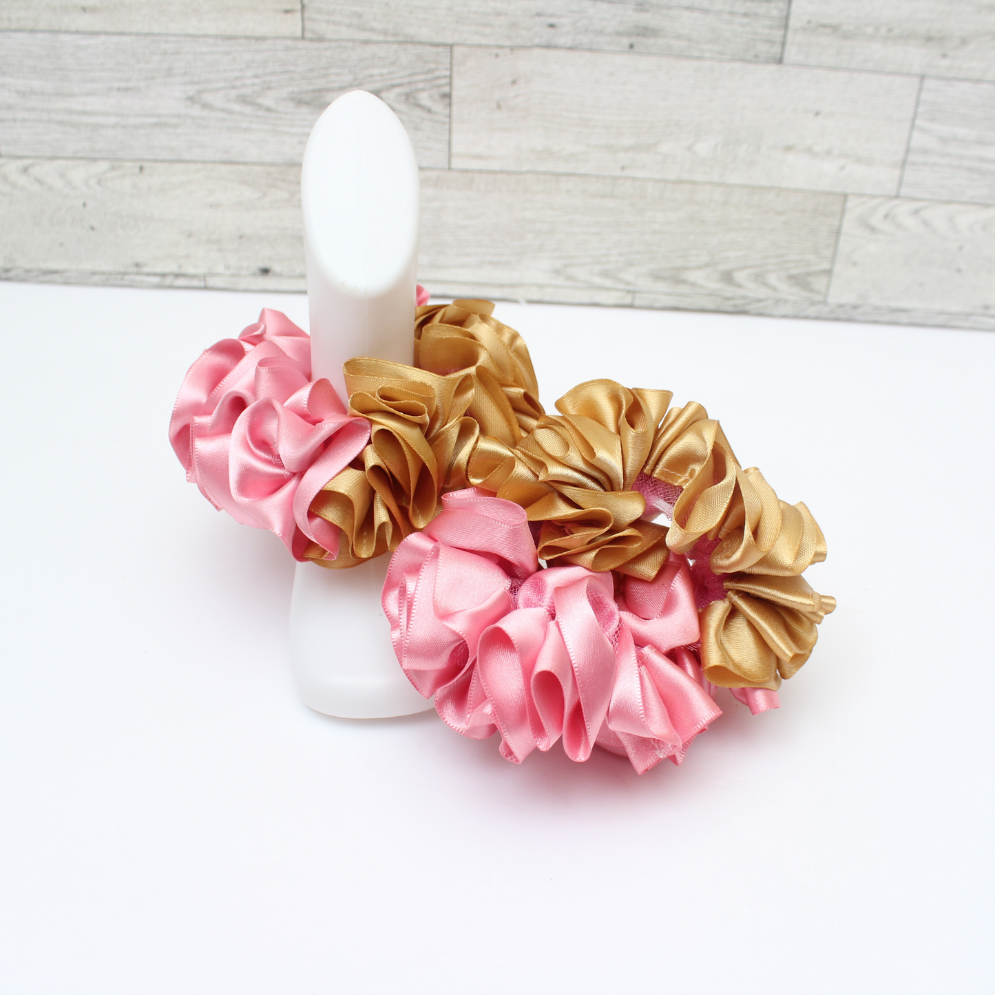 Complete pink floral newborn gift bundle with matching handmade accessories.