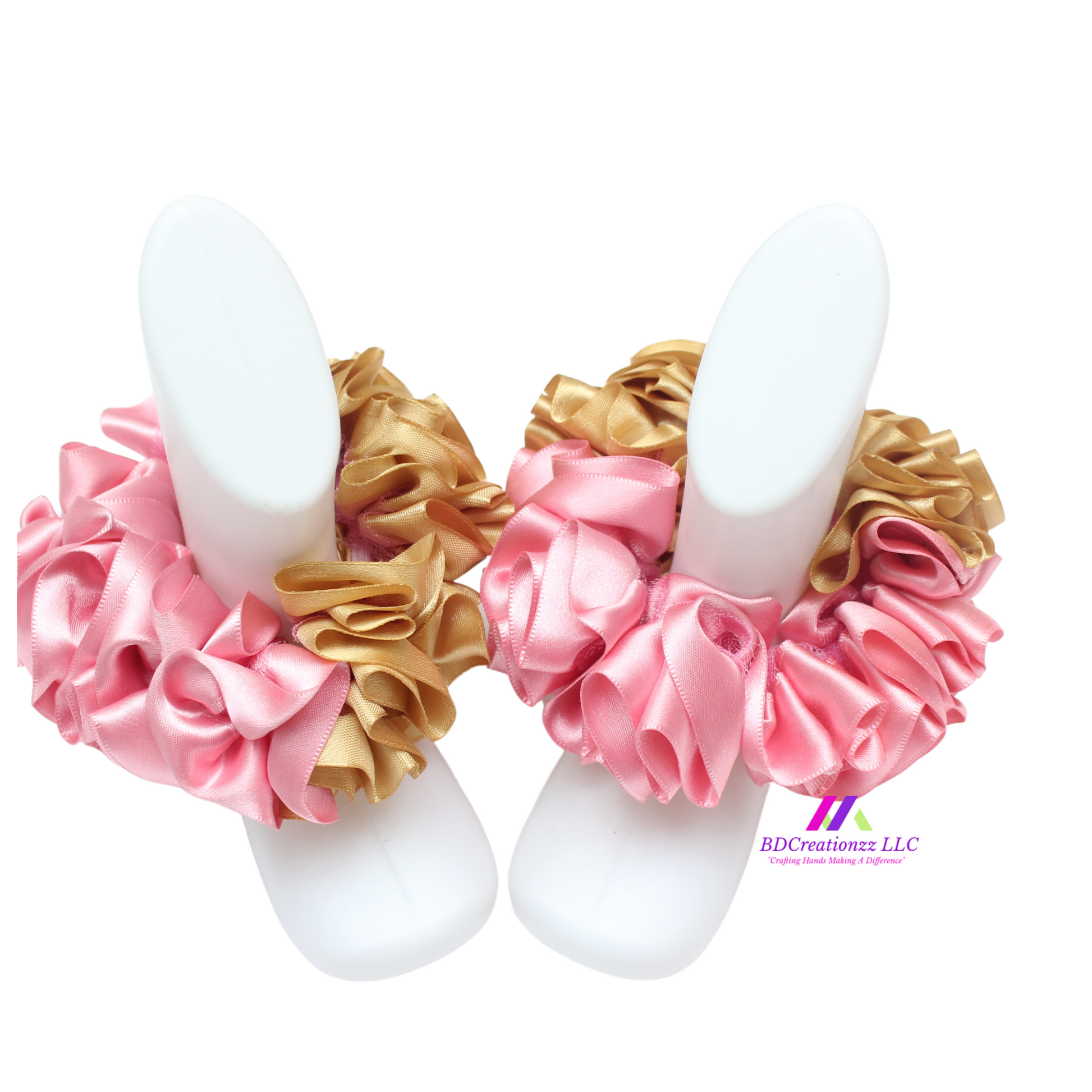 Close-up of pink and gold handmade detachable ruffle socks.